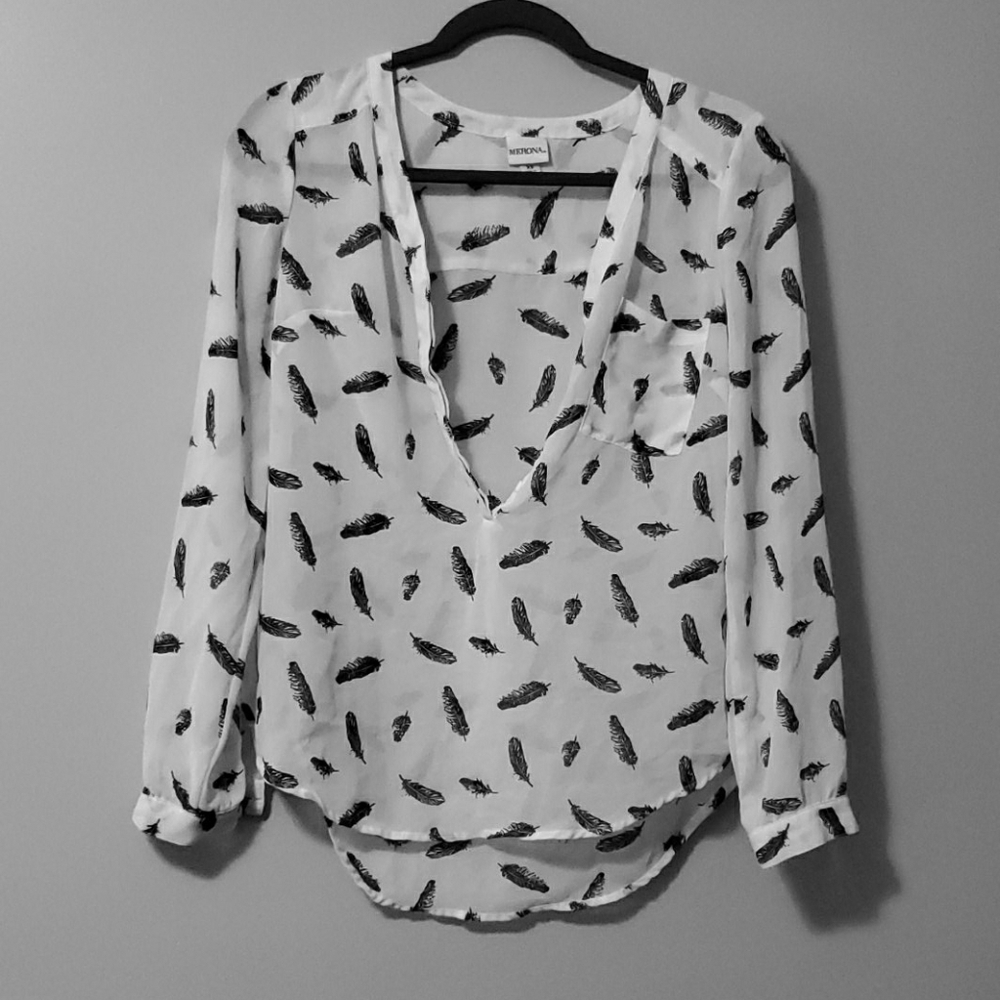 Sheer white shirt with black feathers